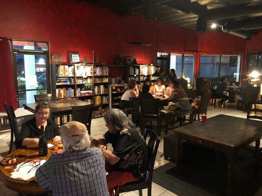 Families, friends and dates playing board games and having fun