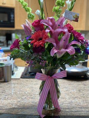 Beautiful arrangement!  Fresh, high quality, colorful, and bright!