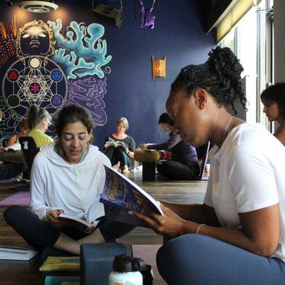 Students read the sutras during 200hour Yoga Teacher Training