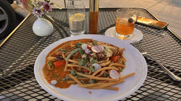 Chicken Parmesan with Bucitini in house and  homemade pasta