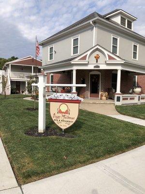 The front building is our home and location for breakfast. All suites are located in the Guest House behind our home.