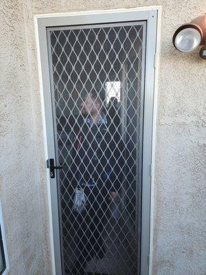 This is a Sentry Security Screen Door that Roberto installed for us.