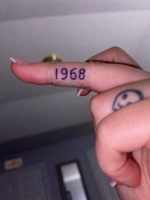 1968 number tattoo.