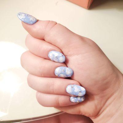 Full set acrylic nails with cloud design