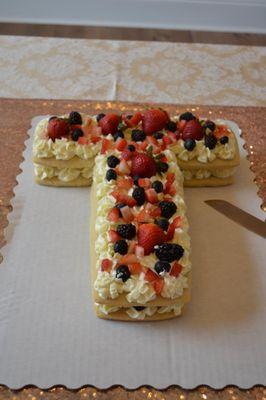 Cookie tart with chantilly icing and fresh fruit.