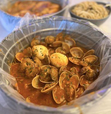 Middleneck Clams w/ ultimate sauce (cajun + garlic butter), "spicy", hard boiled eggs | $18.99/lb