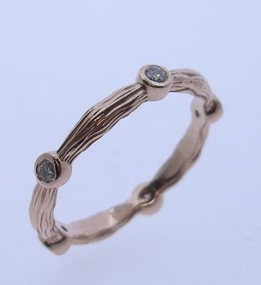 The "twig"ring in 14 karat rose gold and diamond.