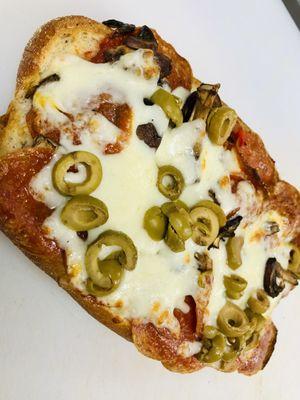 Pizza sub with mushroom and green olive.  Homemade pizza sauce, robust and full of flavor!