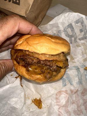 BBQ BACON CHEDDAR BURGER with onion rings on burger