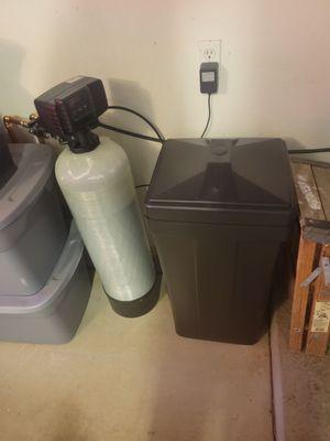 Water softening system and salt tank.