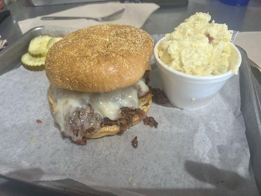 'The Q' brisket sandwich. Potato salad