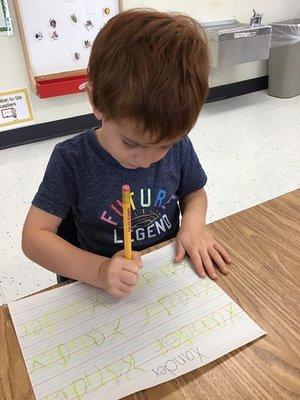 Learning to spell his name