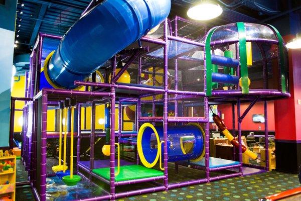 The Quest is a spectacular, multi-storied, indoor play piece consisting of tunnels, tubes, slides, and various physical challenges for kids.