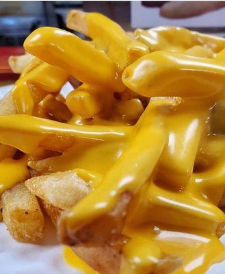 BarFly has the cheesiest fries add bacon for an additional $3