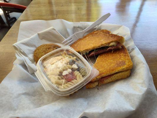 Salami & mozz sandwich with a side of pasta salad and a cookie