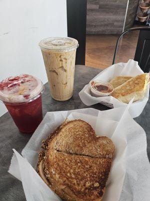 Southwest Chipotle Panini. The breakfast burrito. A Sunshine Tea. Caramel Canyon Cold Brew.