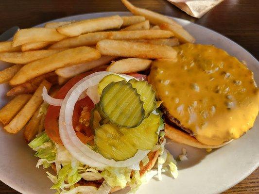 Yummy cheeseburger and fries.