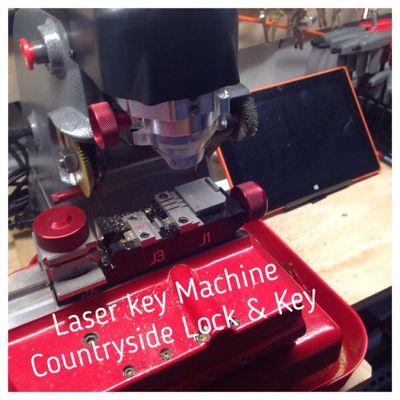 Laser key machine