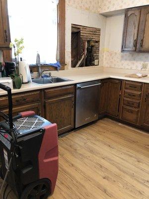 Over 950 to take 2 cabinets off the and cut that hole. That's their dehumidifier