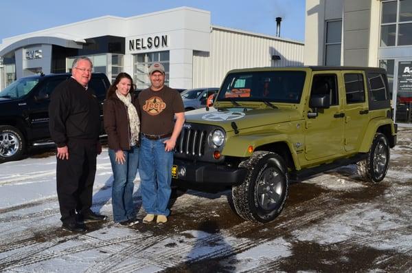 Mark Morris with David & Lisa from Fergus Falls, MN taking delivery of a 2013 Jeep Wrangler Limited Freedom Edition. Nice Rig!