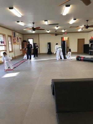 Obstacle course time in Little Warriors class.