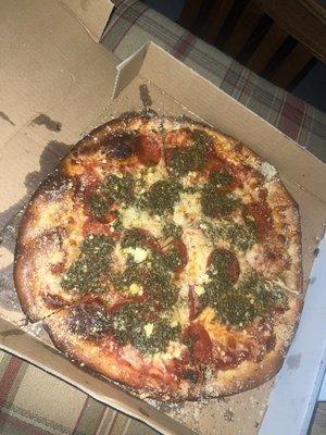 Custom small pizza! Red sauce, cheese, Feta cheese, garlic, and pesto well done