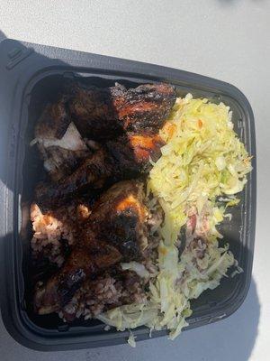 Jerk chicken, rice & red beans. Steamed cabbage