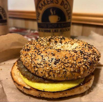 Sausage egg and cheese on an everything bagel. Iced coffee with 1 milk 2 sugars.