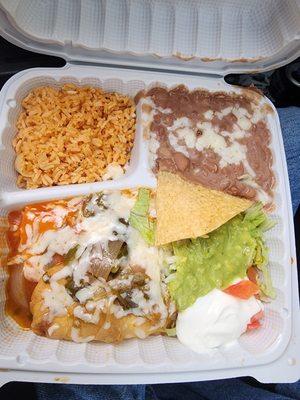 Chile relleno, chicken enchilada with rice beans and sour cream and guacamole.