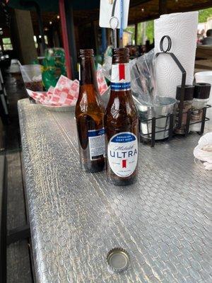 Two empty beers with nobody coming coming back asking if we needed anything else.