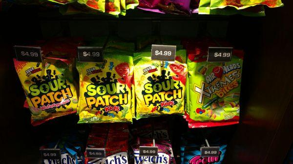 At the shop next door. Save $1 if you buy 2.  $10 for sour patch...ATE U KIDDING ME. Welcome to the airport.