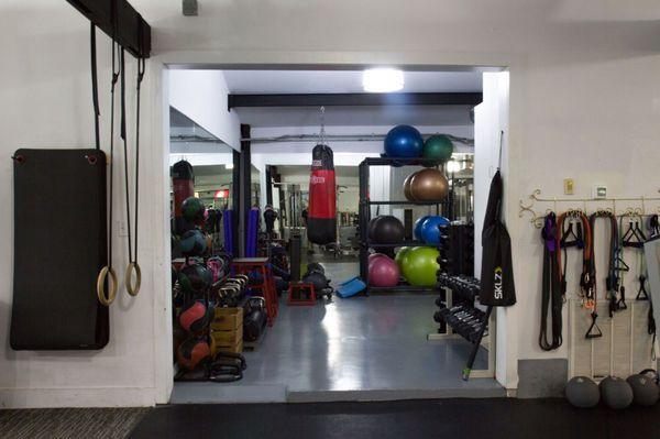 Alcove: stability balls, kettlebells, slam balls, medicine balls, versa bars, jumping boxes, boxing.