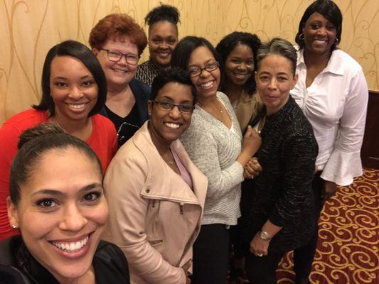 Team members enjoying a selfie at a continuing education event.