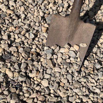 57'S RIVER ROCK Smooth earth-tone colored stones, approximately 1/2" - 1".  Used for decorative landscaping, walkways & driveways