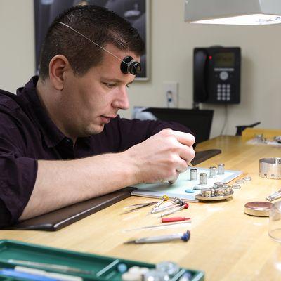 On-site watch makers repair and service fine timepieces.