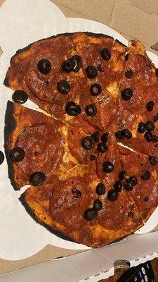 This is the burned pepperoni black olive pizza tonight!