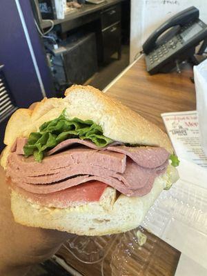 Liverwurst , onion, lettuce, tomato, mayo and mustard