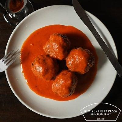 Mamma's Housemade Meatballs, served with our housemade tomato sauce.