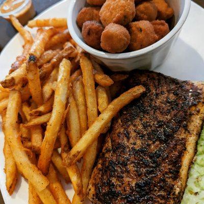 Blacked Mahi Mahi fish with fried okra and fries