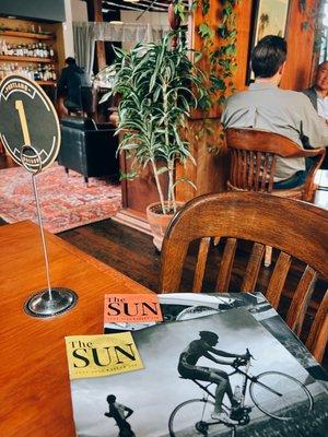 I love they have copies of The Sun here :) *interior of cafe*