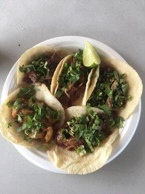 Tacos no onions.  Carnitas lengua cabeza asada chicharrones