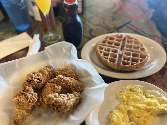 CF Chicken & Waffle with a side of two scrambled eggs.