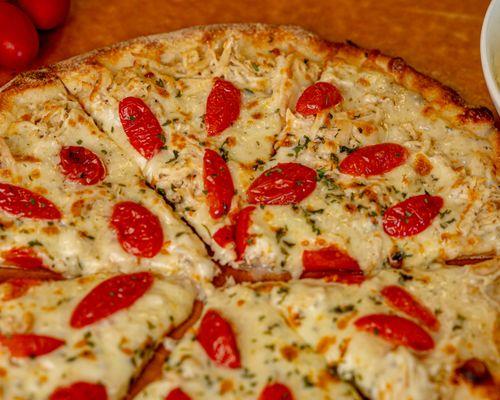 Chicken Alfredo with fresh tomatoes