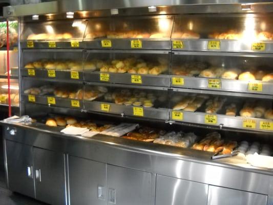 Inside of Bakery. Average 80 cents per baked bun. Saw classic egg tarts, pineapple buns, garlic bread, rice cakes, etc.