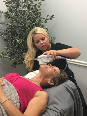 Natalie performing an Ultherapy in Addison