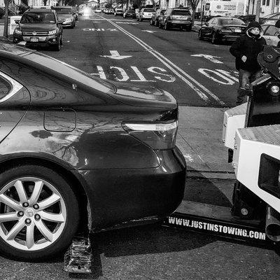 Towing car from blocking a community driveway in queens