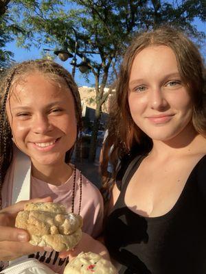 My friend and I eating the sugar cookie and lemon crinkle ecookie