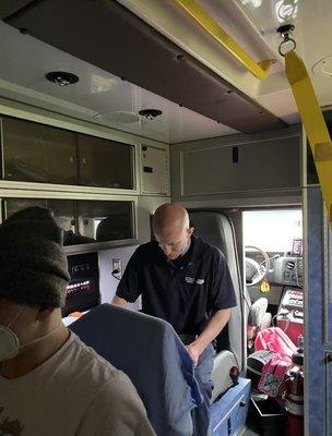 EMT sitting next to my 17 year-old son, who has cancer, with NO MASK.