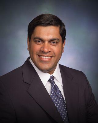 Dr. Sanjay Mukerji, MD  Board Certified Plastic Surgeon