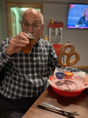 Dad enjoying his beer and soft pretzel at White Buffalo!